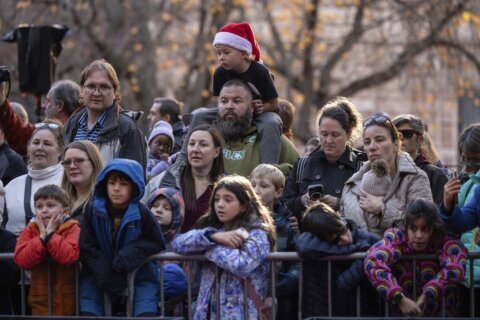 Macy’s Thanksgiving Day Parade kicks off in steady rain a century after its first trip through NYC