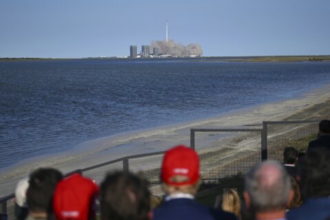 SpaceX launches giant Starship rocket, but aborts attempt to catch booster with mechanical arms