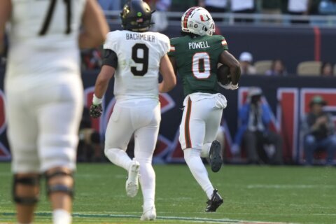 No. 11 Miami pulls away in the 4th, tops Wake Forest 42-14 to move 1 win from ACC title game