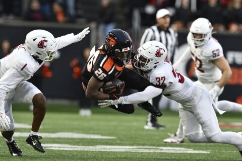 Oregon St. claims Pac-12 ‘title’ and snaps a 5-game skid with 41-38 win over No. 25 Washington St.