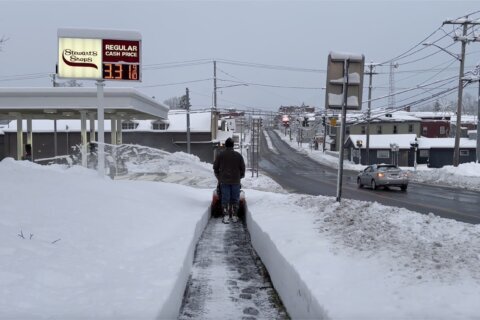 Storm blankets parts of the US during busy holiday travel weekend with more snow and cold forecast