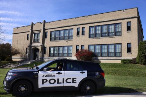 Teen is in custody after trying to enter Wisconsin elementary school while armed, police say