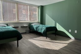 two beds in a room at the Aston shelter