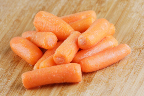 Dozens are sickened and 1 person died after eating carrots contaminated with E. coli