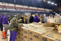 volunteers pack meals