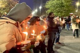 Members of the community at candlelight vigil