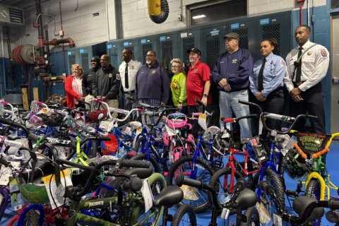 ‘This gives you the Christmas spirit’: Volunteer firefighters in Prince George’s Co. collect bikes for kids