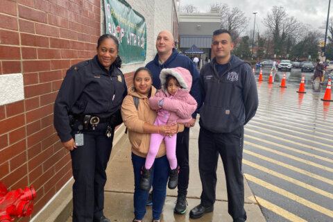 Firefighters reunite with girl who lost fingers in meat grinder accident, help her shop for Christmas