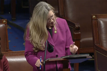 In this image from video Rep. Jennifer Wexton, D-Va., uses an AI program on her iPad to speak in the chamber of the House of Representatives, Thursday, July 25, 2024 at the Capitol in Washington.  A rare neurological disease robbed Wexton of her ability to speak clearly. But with the help of a powerful artificial intelligence program, the Virginia Democrat usee a clone of her voice to deliver what is believed to be the first speech on the House floor ever given via a voice cloned by artificial intelligence, thrusting Wexton into a broader debate about over artificial intelligence.  (House Television via AP)