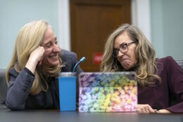 Rep. Abigail Spanberger, D-Va., left, talks with Rep. Jennifer Wexton, D-Va., during an interview with the Associated Press on Capitol Hill, Wednesday, Dec. 4, 2024, in Washington. (AP Photo/Mark Schiefelbein)