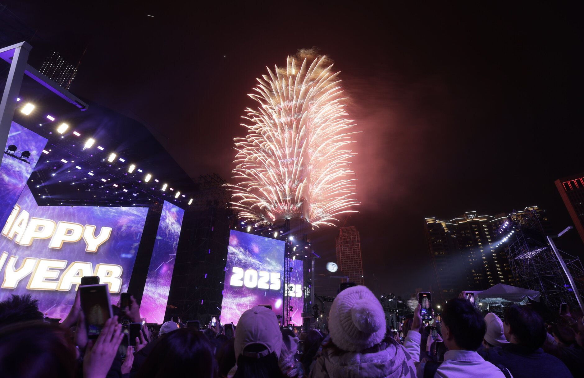 Fireworks explode from the Taipei 101 building during the New Year's celebrations in Taipei, Taiwan, Wednesday, Jan. 1, 2025. (AP Photo/Chiang Ying-ying)