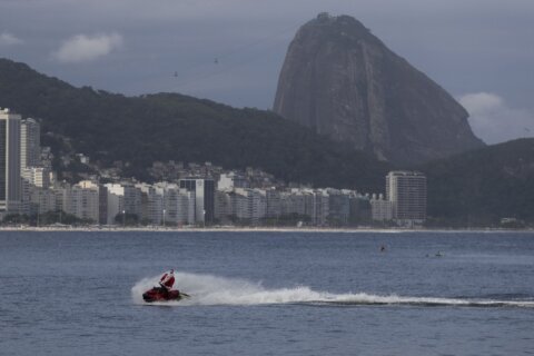 Brazilian Santa swaps sleigh for Jet Ski to deliver toys — and joy — to disabled children in Rio