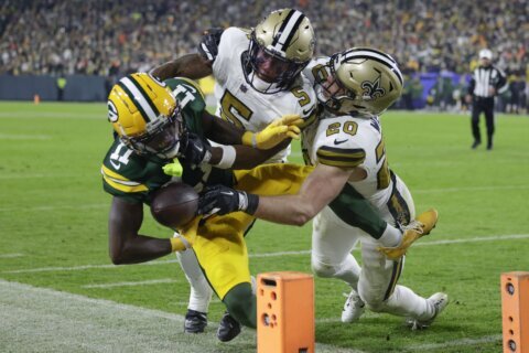 Packers clinch playoff berth with 1st shutout in NFL this season, 34-0 over Saints