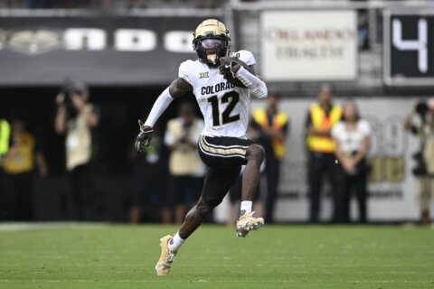 Travis Hunter, the 2-way standout for Colorado, is the AP college football player of the year