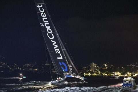 2 sailor deaths result in muted celebrations on winning yacht in Sydney to Hobart race