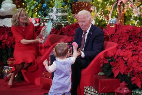 Biden and the first lady bring holiday cheer to patients and families at a children’s hospital