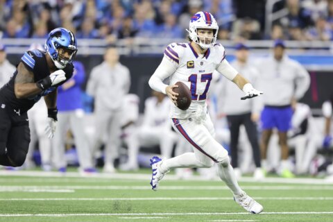 Allen throws for 2 TDs, runs for 2 scores to lift Bills to 48-42 win that snaps Lions’ streak