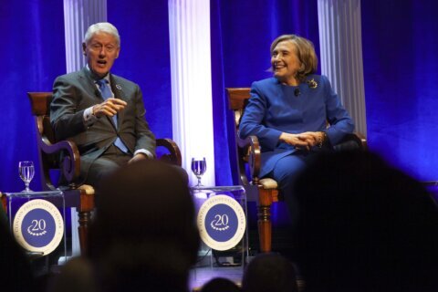 Clintons urge voters agitated by today’s politics to remain involved in public service