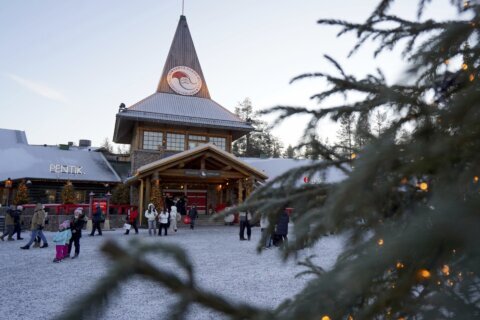 As tourists discover Finland’s Santa Claus Village, some locals call for rules to control the masses