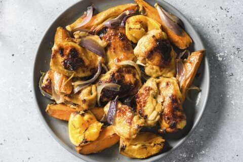 Roasted orange delivers big flavor in this smoky chicken traybake