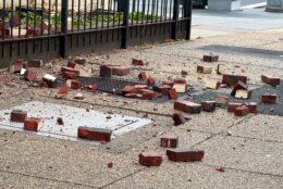 Bricks scattered on the sidewalk