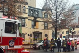 Fire crews around partial collapsed building