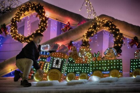 Elaborate holiday light displays are making spirits bright in a big way