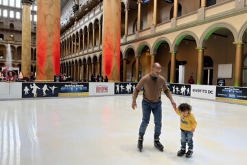 father and son ice skating