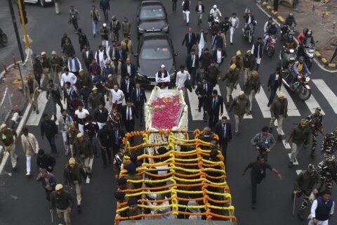 Former Indian Prime Minister Manmohan Singh, who instituted economic reforms, cremated in New Delhi