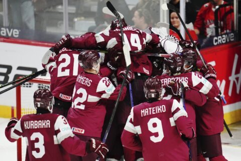 Latvia stuns Canada in world junior hockey, winning 3-2 on lone shootout goal