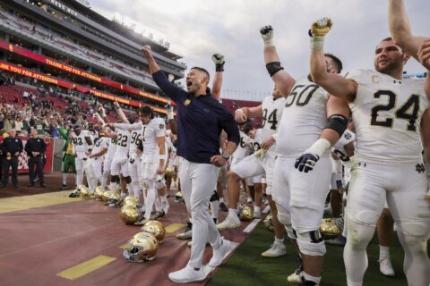 Notre Dame and Indiana get 1st taste of playoff football under the Friday night lights