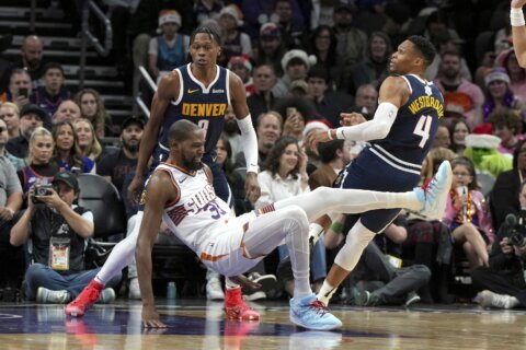 Durant and Beal score 27 points each, Suns beat Nuggets 110-100 to close out Christmas slate