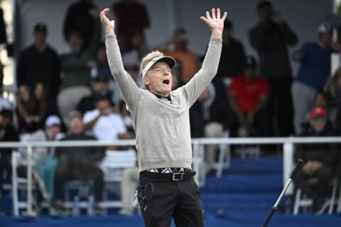 Tiger’s son makes the ace. Bernhard Langer makes the winning putt in playoff over Woods at PNC