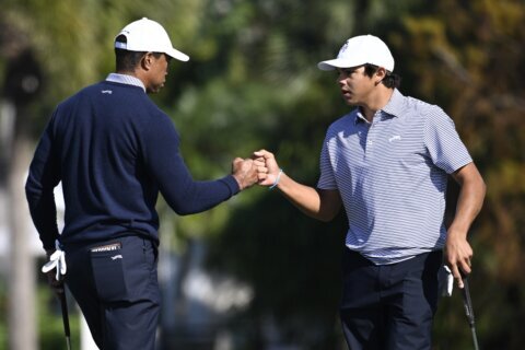 Tiger Woods and son Charlie share the lead at PNC Championship