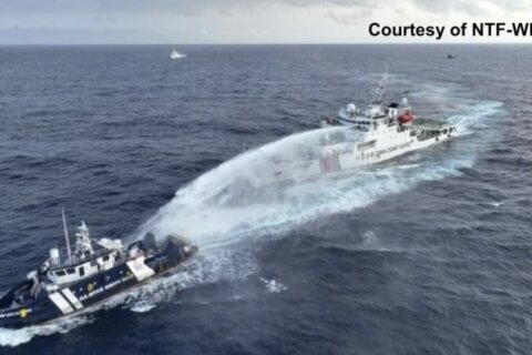 Philippines says China’s coast guard blasts water cannon and sideswipes patrol vessel