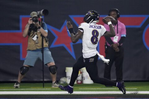 Lamar Jackson breaks NFL QB rushing record, accounts for 3 TDs in Ravens’ 31-2 romp over Texans