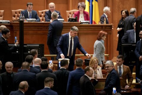 Romanian lawmakers narrowly approve new pro-European coalition during period of political turmoil