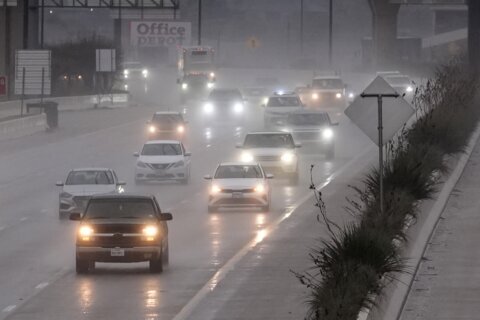 Powerful thunderstorms rumble across Texas, delaying holiday travel