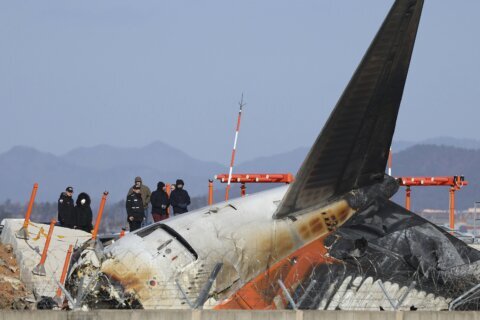 US and Boeing investigators examine the site of a deadly South Korean plane crash