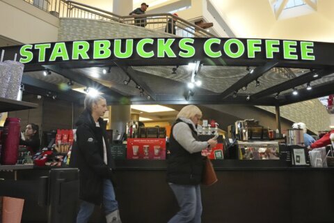 Starbucks workers plan strikes that could spread to hundreds of US stores by Christmas Eve