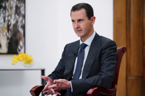 Syria’s ousted leader Assad says he wanted to keep fighting but Russian allies evacuated him