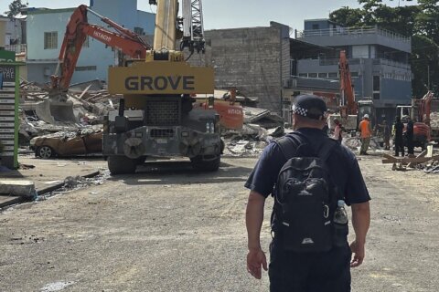 Number of dead and missing still unclear as first aid arrives in quake-hit Pacific nation of Vanuatu