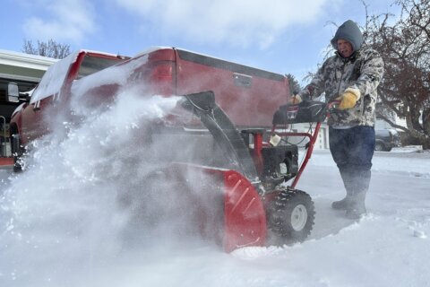 Snow, ice and strong winds make for dangerous conditions in upper Midwest