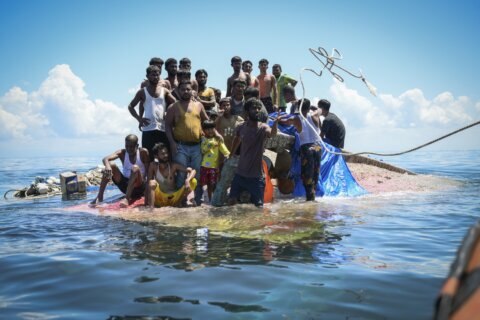 Sri Lanka’s navy rescues 102 Rohingya refugees found adrift aboard a fishing trawler