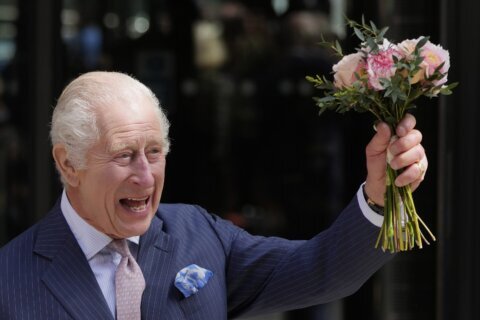 AP photos capture British royal family’s year of illness and recovery