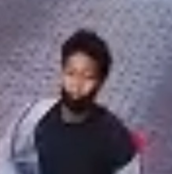 a surveillance photo of a suspect