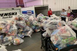 A truck filled with bags of toys