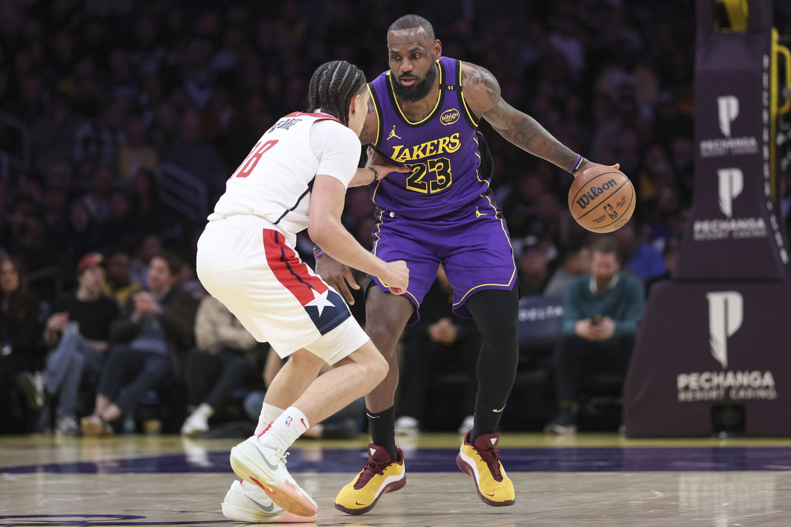 LeBron has a triple-double 1 day after cheering on Buckeyes in Atlanta. Lakers beat Wizards 111-88 - News