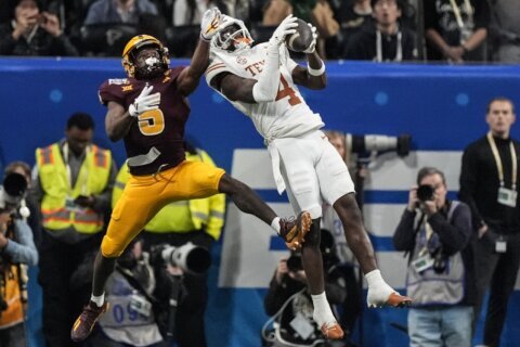 Texas avoids huge upset, beats Arizona State 39-31 in double overtime in Peach Bowl