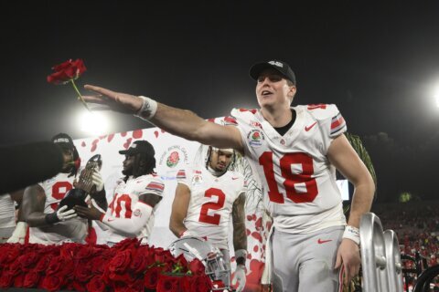 Surging Ohio State to face tenacious Texas in the Cotton Bowl for a spot in the CFP title game